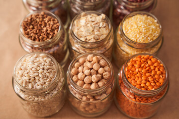 Super food grits in glass jars. Top view. Commercial
