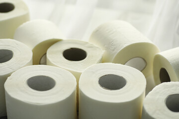 Toilet paper in a roll. Snow-white soft three-layer toilet paper. Lack of hygiene products. Primary protection and disinfection.