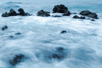 Rocks that surround the water