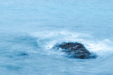 Naklejka premium long exposure of sea and rock