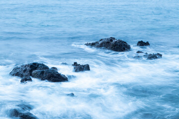 Fototapeta na wymiar Line of rocks in the sea