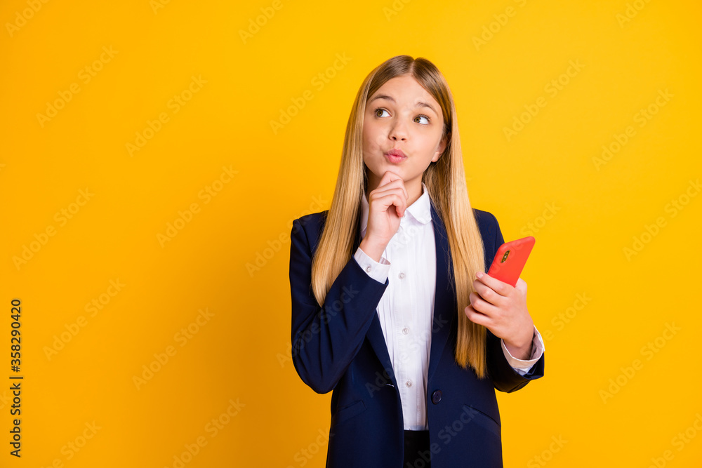 Poster Portrait of her she nice attractive pretty creative cheery minded long-haired girl using cell creating new post chatting boyfriend isolated bright vivid shine vibrant yellow color background