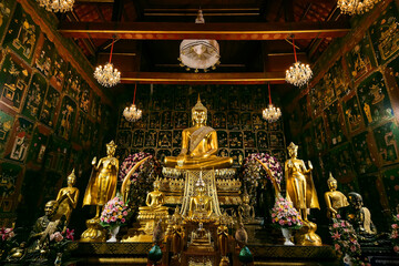 Fototapeta premium Ayutthaya, Thailand -July, 31, 2018 : Golden Buddha in Wat Phanan Choeng, Buddha statue of Ayutthaya, Thailand