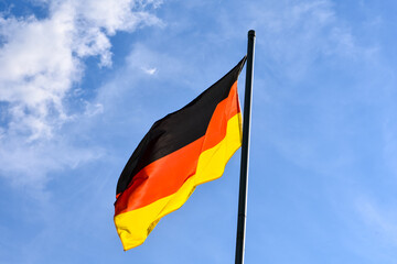 german flag against blue sky