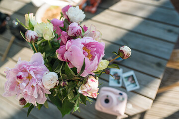 beautiful summer flowers in the table in front of forest