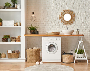 Laundry room interior style, washing machine wicker basket white bookshelf and sink.