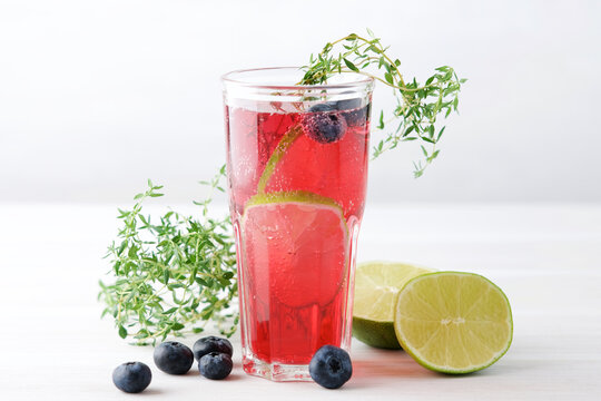 Thyme Berry Summer Cocktail Or Lemonade. Cold Refreshment Non-alcohol Drink With Blueberry Juice In Glass