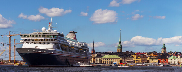 Panoramic view of Stockholm, Sweden. The view from the water. A large passenger cruise ship. A...