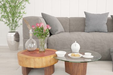 modern room with sofa,pillows,table with tea set and flowers in vase,plants interior design. 3D illustration
