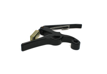 Capo is a small device used to clamp the guitar for strapping or strapping the guitar neck, ukulele, bass.
