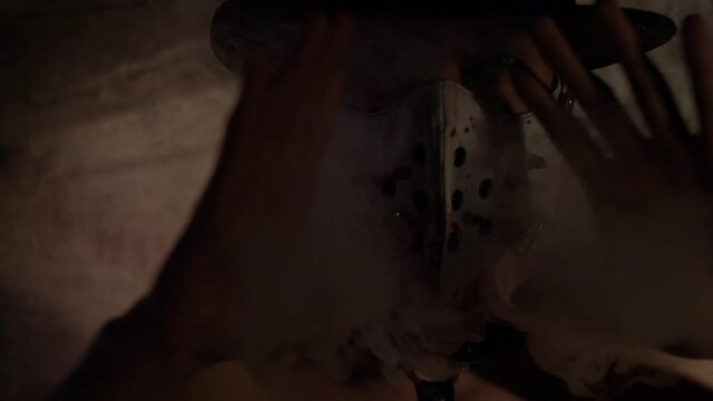 Fetish and BDSM. Brutal strong sexy man in a hat and mask