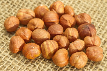 Hazelnuts on burlap close up