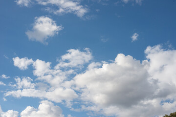 blue sky fluffy clouds heaven