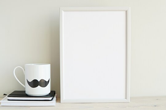 Vertical white frame mockup in monochrome men room for art, photo, lettering, quote, mug with mustache.