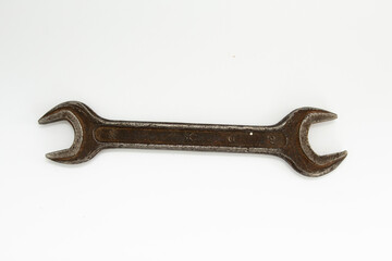 old rusty wrenches on a white background