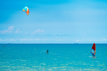 Windsurfing and Kiteboarding Sports on the beach in holiday