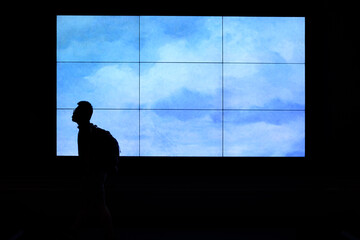 Fototapeta na wymiar silhouette of a man in front of sky