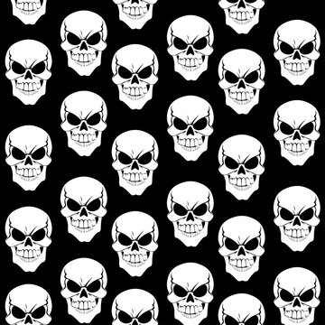 Seamless pattern from black grinning skulls on black background