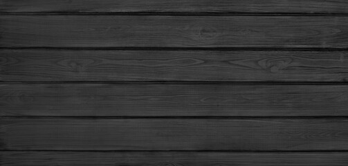 Black wooden board wide texture. Dark wood plank background