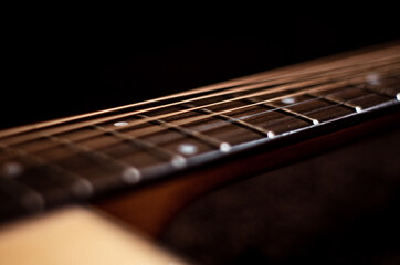 Fototapeta premium Acoustic Guitar on Black Background