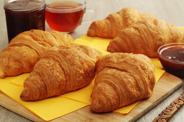 Croissants with marmalade and tea