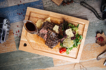 Appetizing beef steak with grilled vegetables