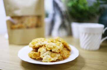 Cornflake cookies on wooden table. Selective focus