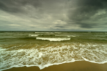 Landscape from above the Baltic sea. Cloudy and windy day, rough sea.