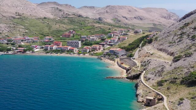 The resort area of Metajna on the island of Otok Pag in Croatia, Aerial flyover approach view
