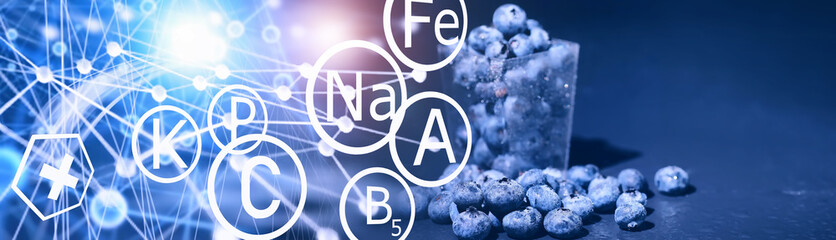 Water drops on ripe sweet blueberry. Fresh blueberries background with copy space for your text. Vegan and vegetarian concept. Macro texture of blueberry berries.