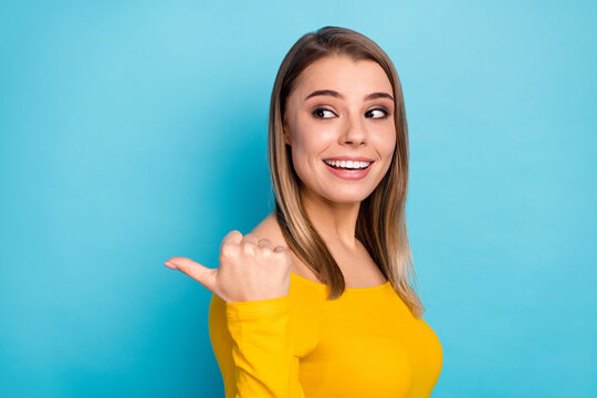 Close-up portrait of her she nice-looking attractive lovely charming pretty confident glad cheerful cheery girl showing ad advert decision isolated on bright vivid shine vibrant blue color background