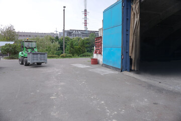 Pipe of the plant with which there is smoke against the sky. Factory and environmental topics of environmental pollution. Stock background for design.