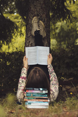 young woman reading a book