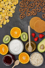 Cereal cookies juice, fruit jam cookies, strawberries, kiwi honey, orange juice.