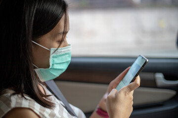 A young woman wearing a protective medical mask. CORONA VIRUS concept. .