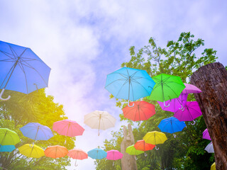 The sky and tree of colorful umbrellas, Street with umbrellas,Umbrella Sky Project. Background colorful umbrella street decoration.