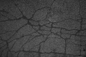 Dark stone wall texture with shadows