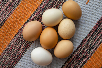 Natural fresh chicken eggs on the home table.