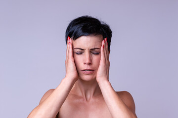 Stressed anxious woman with a headache