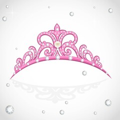 Elegant shiny pink tiara with precious stones and pearl isolated on white background