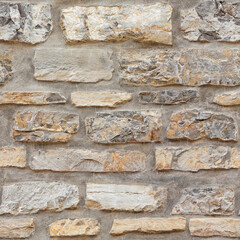 Old weathered brick wall of medieval fortress, horizontal grunge background