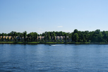 View of the river and promenade in the city on a clear day