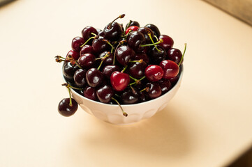 Bowl of fresh delicious red cherries