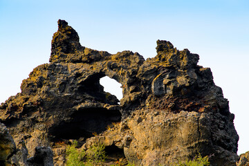 Fototapeta na wymiar Rock formation in Dimmuborgir, a large area of unusually shaped lava fields, Myvatn, Iceland