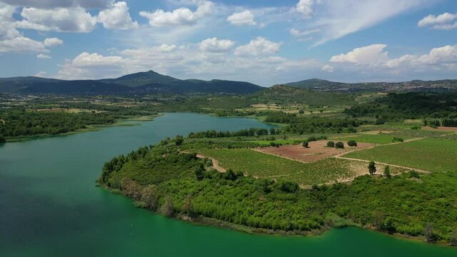 Aerial drone panoramic video of beautiful nature in artificial lake and dam of Marathonas or Marathon that feeds drinking water supply to Athens, Attica, Greece