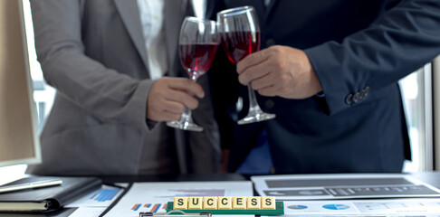Both businessmen drink White to celebrate their financial and business success, Congratulate and celebrate concept.