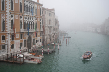 Naklejka premium A day trip to Venice on a gondola in the Grand Canal