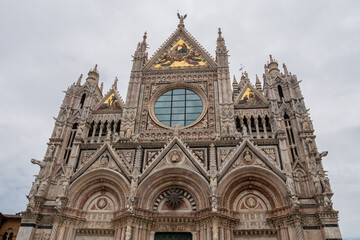 Fototapeta na wymiar View of Siena Cathedral, Duomo di Siena, is a medieval church, now dedicated to the Assumption of Mary