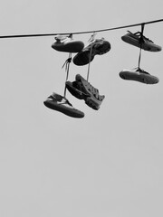 Tossing shoes over power lines