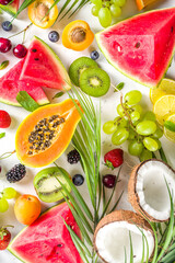 Assorted different summer tropical fresh raw fruits and berries. Clean eating, healthy lifestyle, diet and vitamin concept. 
